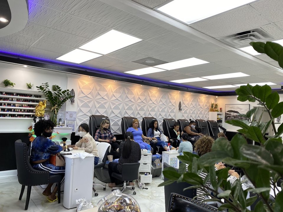 Bright manicure tables inside a Tampa salon.
